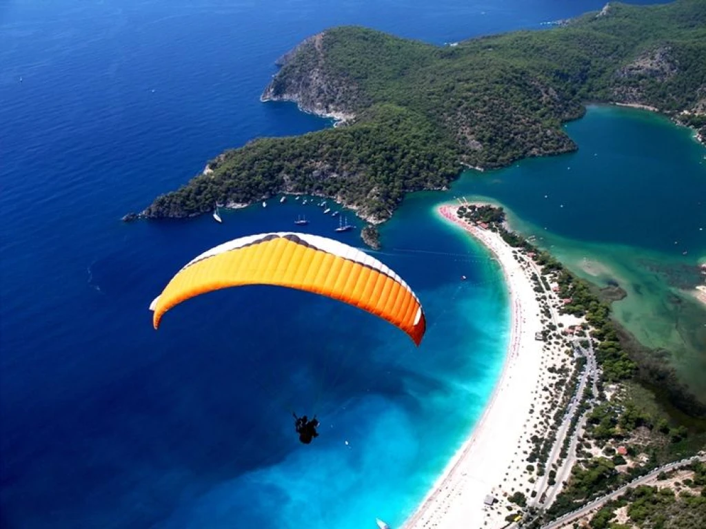 'Adrenaline Enthusiasts Here: Paragliding Packages Including Accommodation'