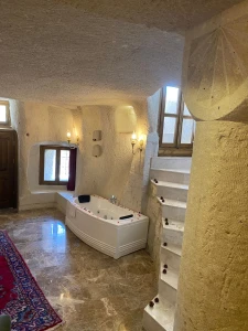 Kapadokya Balayı Paketi | Abu Hayat Cave Suites Sultan Suite | Şömineli Mağara Oda